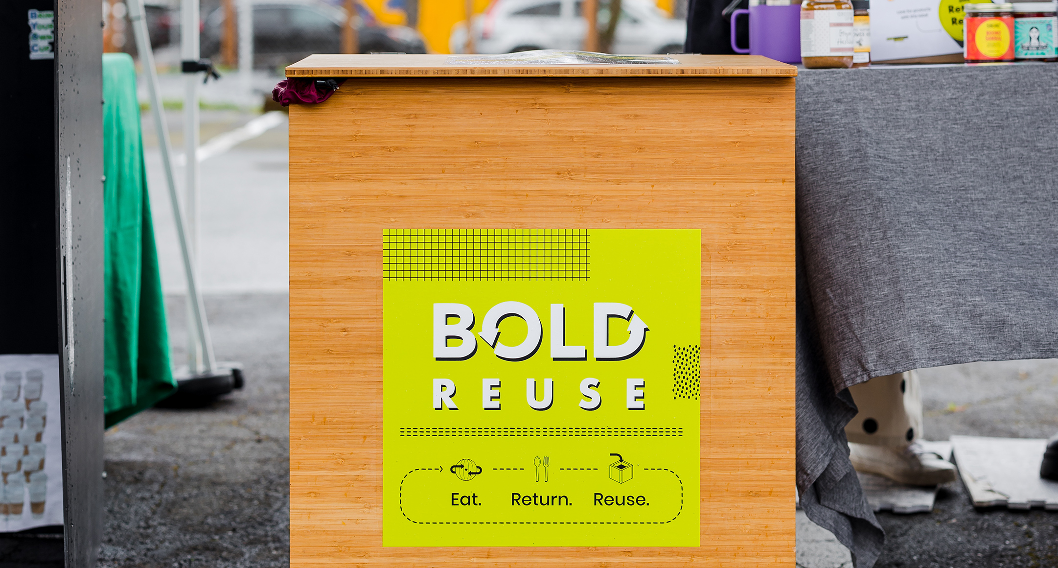 A large brown box designated as the Bold Reuse return for reusable food containers.