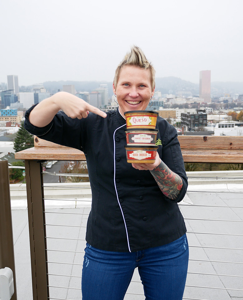 Heidi Lovig of Heidi Ho Foods with her plant-based dips and sauces